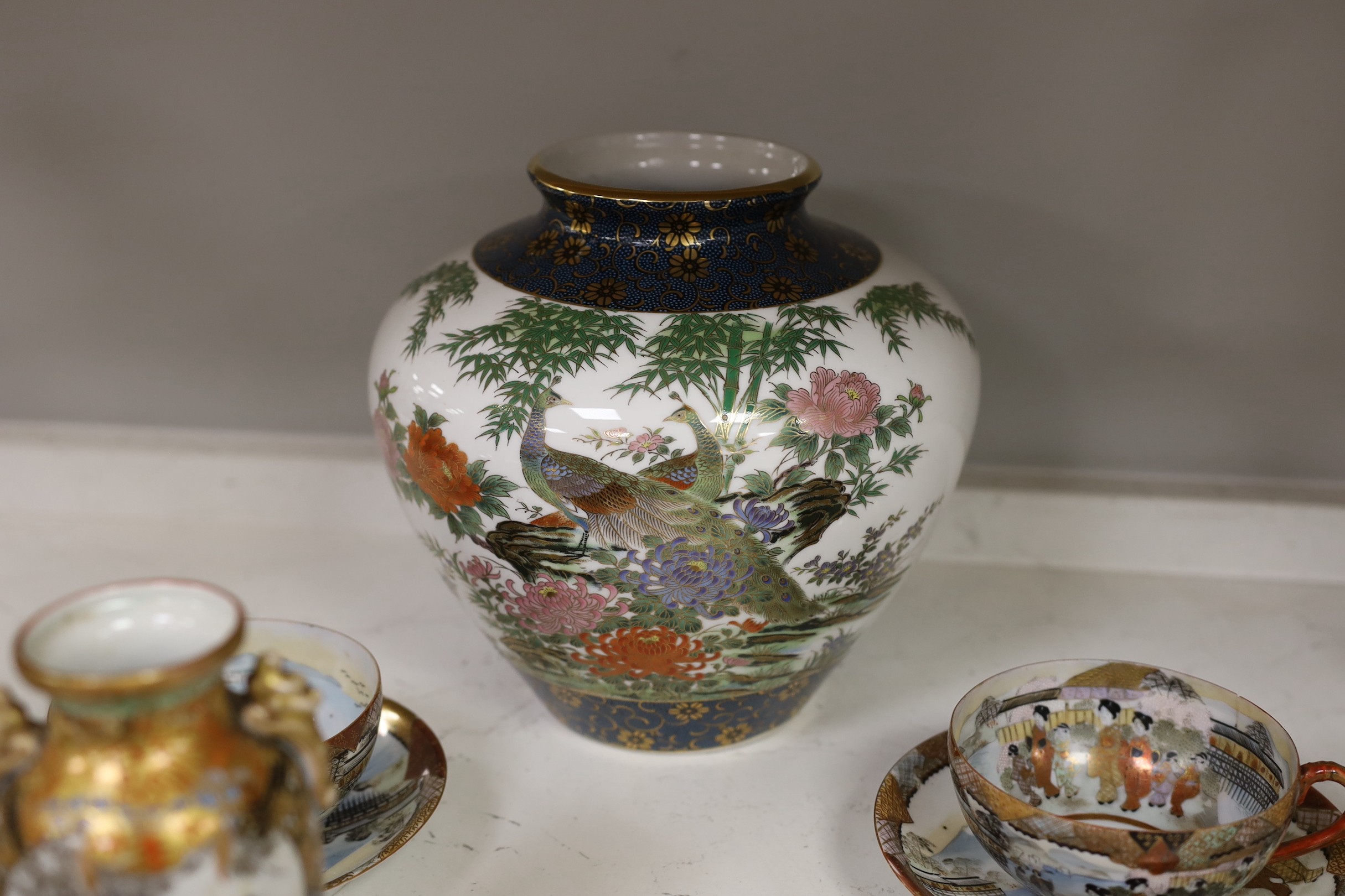 Assorted Japanese ceramics including an Imari bottle vase, a Satsuma vase and Kutani eggshell porcelain